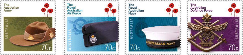 Four defence force stamps featuring the hats and insignia from each entity