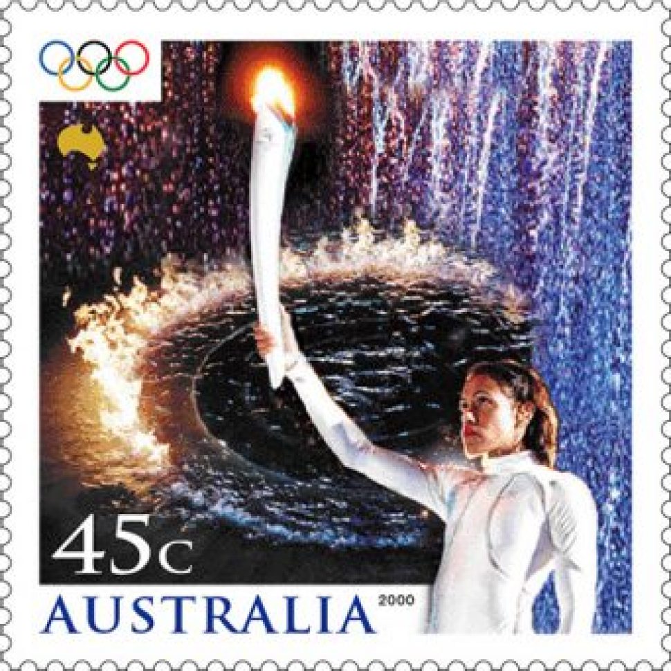 45c stamp featuring Cathy Freeman holding Olympic torch