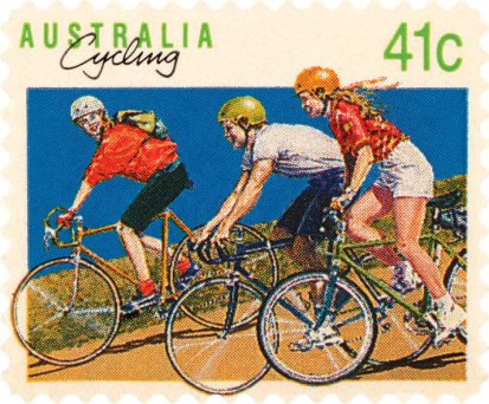 The first Australian self-adhesive stamp issued on 16 May 1990 showing two people riding bicycles